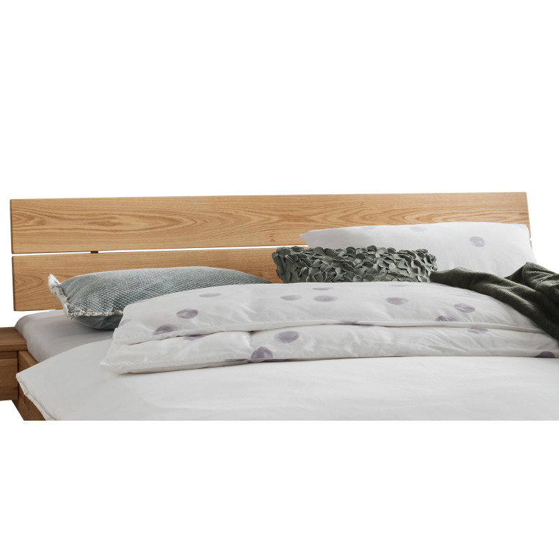 Zweigeteiltes Holzkopfteil des Massivholzbettes "CL"